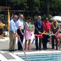 <p>White Plains Mayor Tom Roach, center, and Recreation &amp; Parks Commissioner Wayne Bass (in red shirt) at Wednesday&#x27;s ribbon-cutting ceremony. Kittrell Pool was in need of an upgrade and I am thrilled with the result,&#x27;&#x27; Bass said.</p>