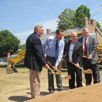 <p>CIFC board chair Frank Muska, Gov. Dannel Malloy, Mayor Mark Boughton and CIFC President James Maloney turn over a ceremonial shovel full of dirt at the groundbreaking of a new Community Health Center on Main Street in Danbury. </p>