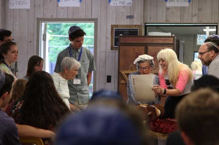 Esther Geizhals, of Larchmont, (center) has her bat mitzvah at the BBYO International Kallah in Lake Como, Pa. this past weekend.