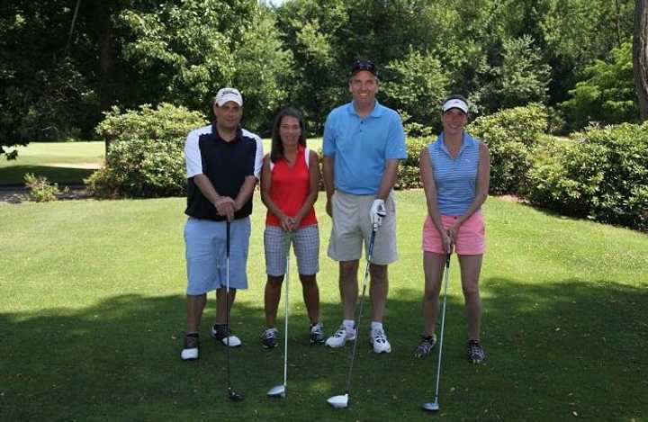 From left, Mike Testa, Janine DiCarlo, Dan Donovan, Lauren Ryan at the golf outing, which has raised more than $6 million for charity in its 28-year history.