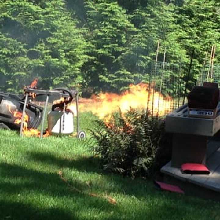 Flames shoot out from a propane tank at a grill fire in Westport. No one was injured. 