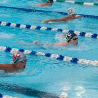 <p>One of the boys races Thursday at Rye Playland.</p>