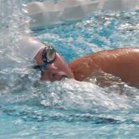 <p>Elizabeth Epes, 12, of Pelham, swims the 12U 50 freestyle Thursday at Rye Playland.</p>