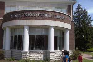 Mount Kisco Library Holding 'Gravity Painting'