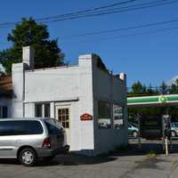 <p>A fire-damaged house in Mount Kisco is located behind a group of commercial buildings off of East Main Street.</p>