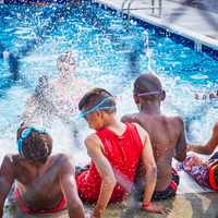 <p>Children enjoy the pool at Camp Felix.</p>