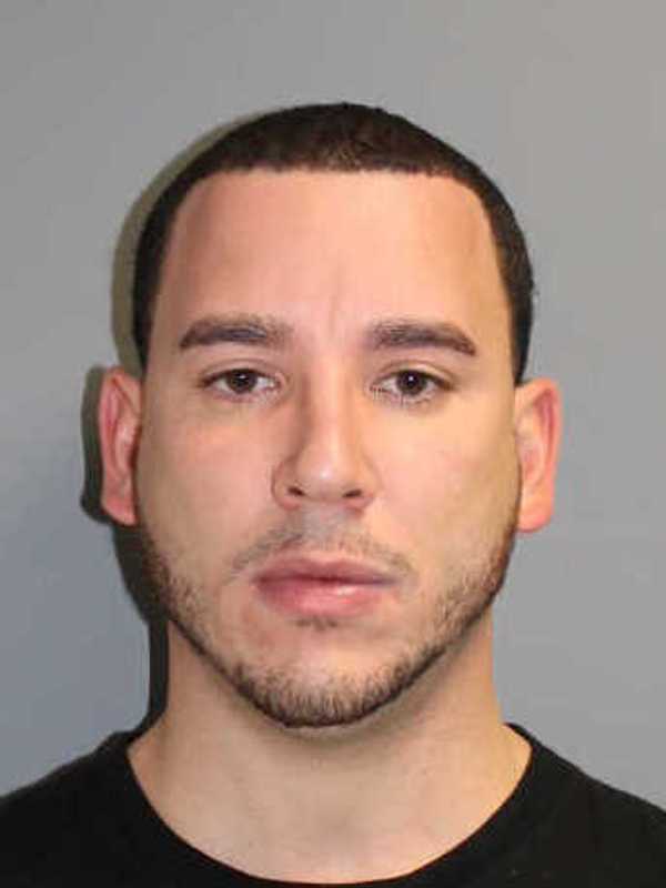 Norwalk Man Arrested On Gun Charges In Parking Lot