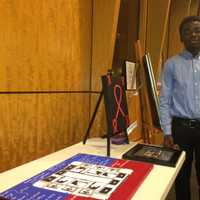 <p>Markenson Luctama displayed his artwork at the Harlem Fine Arts Show Thursday.</p>