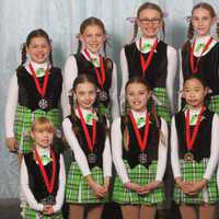 <p>Girls on the Sprites show their silver medals.</p>