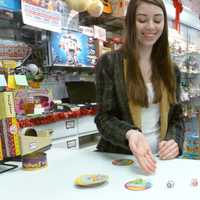 <p>Julia Hardy, 17, left, and her sister Sarah, 15, play a game of Speedeebee at the New Canaan Toy Store. </p>