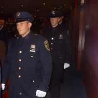 <p>Graduates of the Westchester County Police Academy file into their ceremony on Friday.</p>