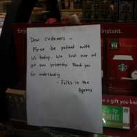 <p>This sign was posted at the Starbucks at Danbury Fair Mall Saturday morning. </p>