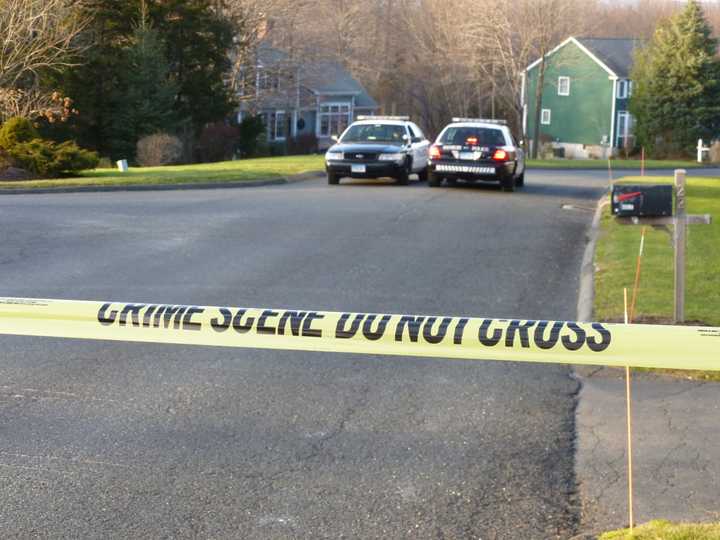 Newtown police sealed off a section of Yogananda Street on Saturday, the day after Adam Lanza killed his mother, Nancy, at home. Lanza then went on to kill 26 others at Sandy Hook Elementary School before turning the gun on himself.