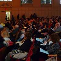 <p>The concert hall at Norwalk City Hall was filled Sunday afternoon at a vigil held to mourn those lost in the Sandy Hook Elementary School.</p>