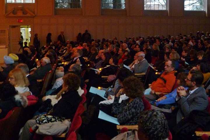 The concert hall at Norwalk City Hall was filled Sunday afternoon at a vigil held to mourn those lost in the Sandy Hook Elementary School.