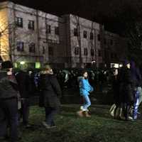 <p>Hundreds of people stood in cold, wet conditions hoping to hear President Barack Obama at a vigil for the victims of the Sandy Hook Elementary School shooting. </p>