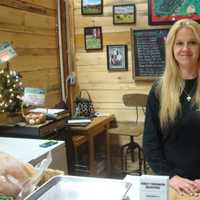 <p>Dana Assard of Percy Thomson Meadows at the SoNo Marketplace said there has been a steady stream of customers since the market opened in early December.</p>