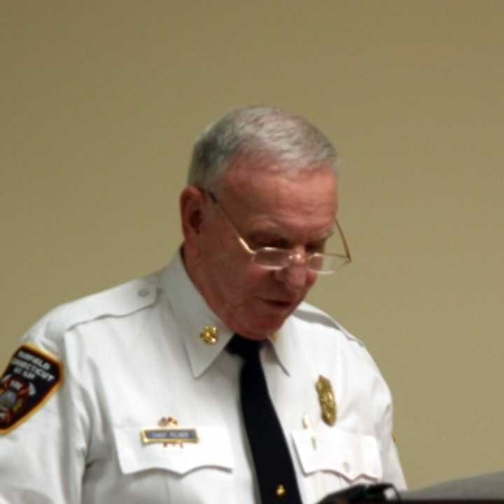 Fairfield Fire Chief Richard Felner reads a statement about his department&#x27;s promotion practices at Wednesday&#x27;s Board of Selectmen meeting.