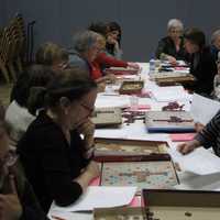 <p>Scrabble enthusiasts learn key strategies Wednesday in New Rochelle.</p>
