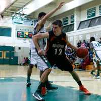 <p>Ridgefield&#x27;s Jeff Racy makes a move in the paint.</p>