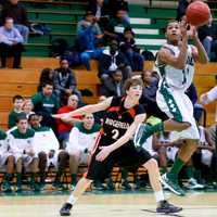 <p>Norwalk&#x27;s Jeremy Linton looks to shoot after getting past Ridgefield&#x27;s Charles Irwin.</p>