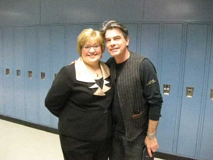 Byram Hills Central Schools Director of Fine Arts Joy Varley, left, stands with Byram Hills alum and television and movie star Peter Gallagher. 