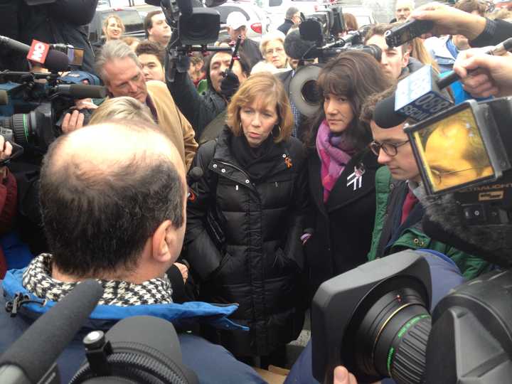 Lori Haas, whose daughter was shot and injured in the Virginia Tech shooting in 2007, helped deliver a petition in Danbury on Tuesday calling for Walmart to halt gun sales.