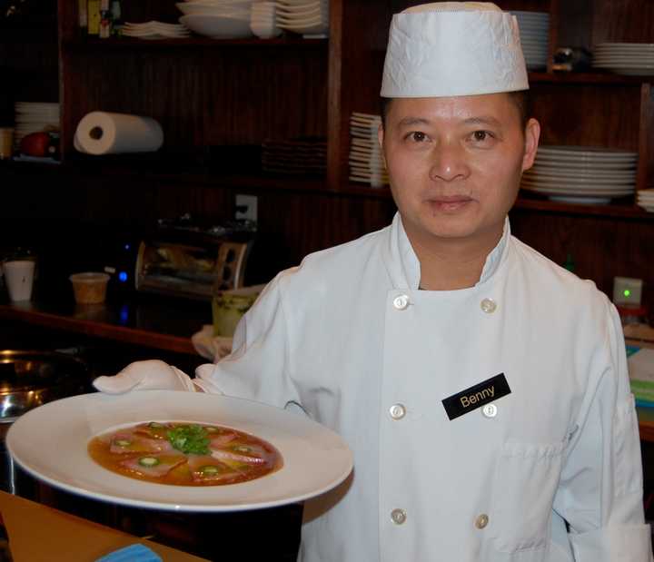 Chef Benny Chow presents one of his many unique  and off-the-menu  dishes at his Ki Asian Bistro in Danbury. 