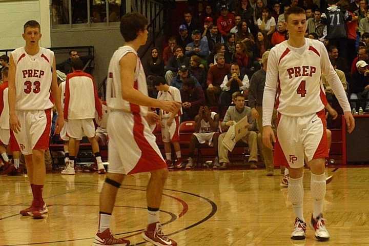 Ryan Murphy (4) and Tim Butala (33) take the court after a timeout for Fairfield Prep in Tuesday&#x27;s loss to HIllhouse.