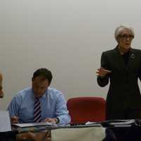 <p>From left, Planning and Zoning Commission member John Katz, Vice Chairman Patrick Walsh and Chair Rebecca Muccetti listen to residents discuss a possible zoning change to the northern stretch of Route 7 in Ridgefield to allow more retail in the area.</p>