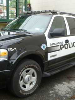 Pleasantville Police Extract Person From Vehicle