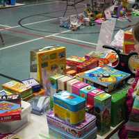 <p>Six-year-old Kathleen Galvin, a first-grader at Scotland Elementary School, looks at the some of the many games and toys for sale.  </p>