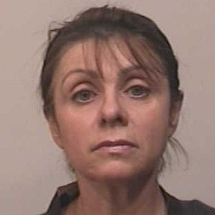 Larisa Lein, 52, of Trumbull was charged with third-degree larceny.