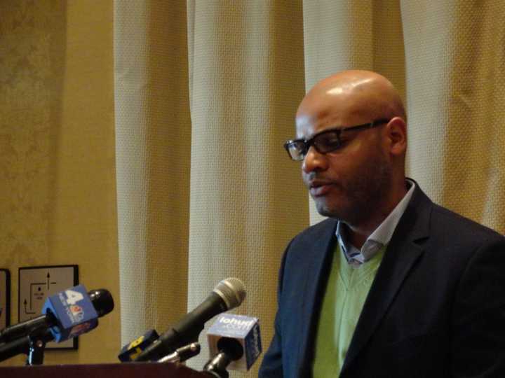 Danroy Henry Sr. speaks with members of the media last week at a press conference in Tarrytown.