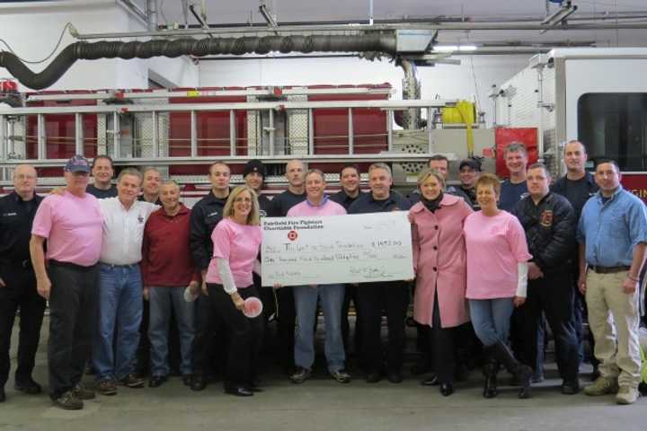 The Fairfield Fire Fighters Charitable Foundation presents a check to the Get in Touch Foundation earlier this month.