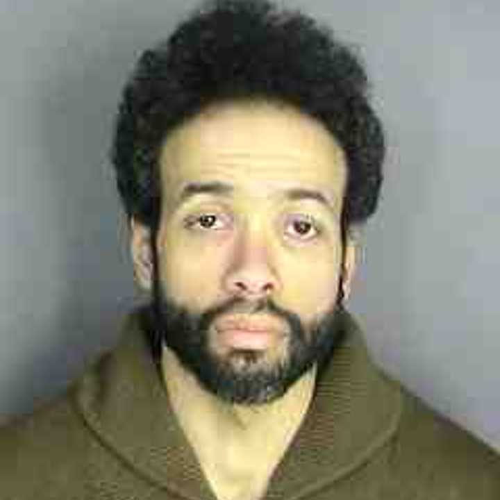 Former city employee Lionel Thomas, 35, was charged Thursday with a felony after prosecutors accused him of  taking nearly $2,000 in bogus fees from Yonkers taxpayers. 