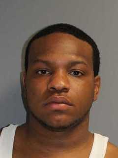 Man Charged With Hitting Norwalk Cop, Carrying Gun