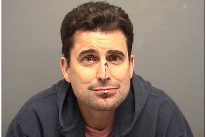 Rob Morrison was arrested in his Darien home Sunday and accused of choking his wife.