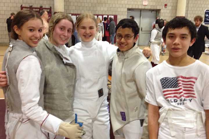 Wilton High School fencers (from second left) Megan Roughan, Tessa Markham, Jai Nagpal and Liam Smith at Saturday&#x27;s state fencing tournament. With them is Zoe Howard from Weston.