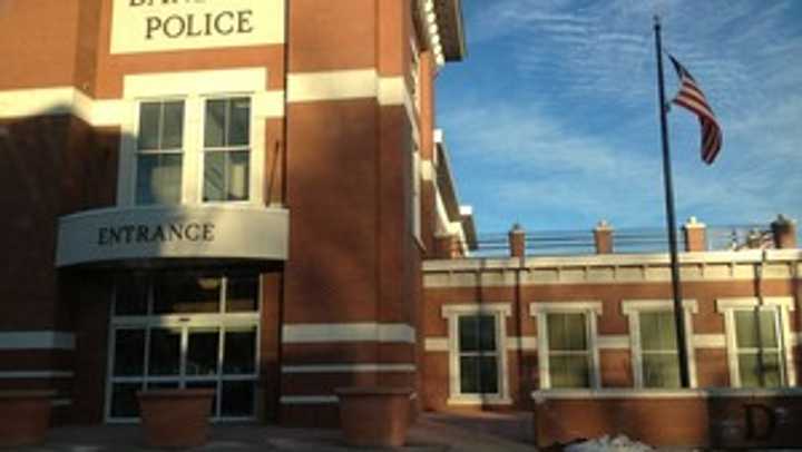 Danbury police arrested the driver of a rolled-over car early Friday on drunken-driving charges. 