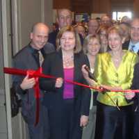 <p>Marsha Gordon, surrounded by fellow members of the Business Council of Westchester, cuts the ribbon at the start of the Mega Mixer Business Expo in Port Chester.</p>