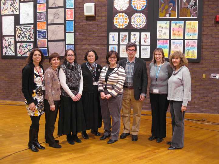 Bedford school district librarians Rina Baldo, left, Victoria Bradley, Lesley Levine, Susan Polos, Nancy Brown, Tom Carrigan, Simone Loeffel and Susan Ackerman-Leibowitz stood before the school board at Wednesday nights school board meeting.