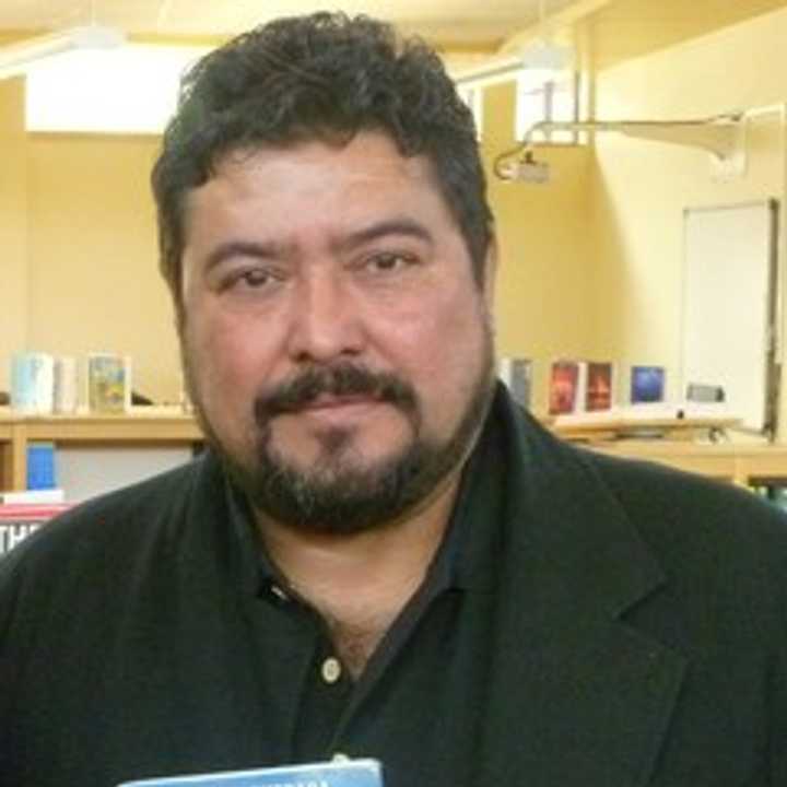 Roberto Quesada&#x27;s work depicts the life and challenges of immigrants in America. He will speak at a symposium at White Plains High School. 