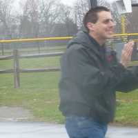 <p>Mark Pastor cheers runners on at the Race For Dare in Easton in 2011.</p>