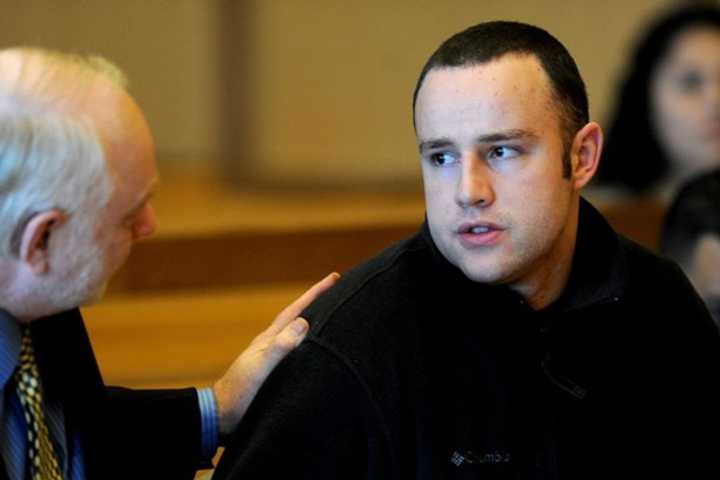 Aaron Ramsey of Wilton sits with his defense lawyer Howard Ehring at the hearing in Stamford where he was found to be not guilty by reason of mental illness in the death of his father. 