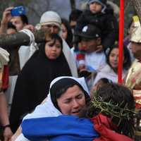 <p>Father Vincent Druding (Jesus) and members of the Assumption Catholic Church congregation carried out a live reenactment of the crucifixion of Jesus on Good Friday,</p>