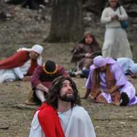 <p>Father Vincent Druding (Jesus) and members of the Assumption Catholic Church congregation carried out a live reenactment of the crucifixion of Jesus on Good Friday,</p>