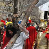 <p>Father Vincent Druding (Jesus) and members of the Assumption Catholic Church congregation carried out a live reenactment of the crucifixion of Jesus on Good Friday,</p>