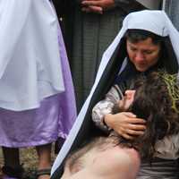 <p>Father Vincent Druding (Jesus) and members of the Assumption Catholic Church congregation carried out a live reenactment of the crucifixion of Jesus on Good Friday,</p>