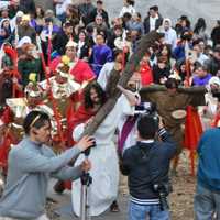 <p>Father Vincent Druding (Jesus) and members of the Assumption Catholic Church congregation carried out a live reenactment of the crucifixion of Jesus on Good Friday,</p>